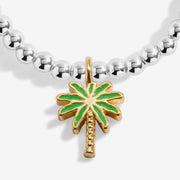 Close-up of Joma Hello Summer bracelet palm tree charm