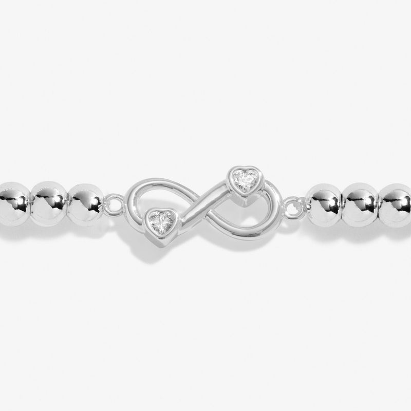 Close-up of Joma Happiest With You bracelet cubic zirconia infinity charm
