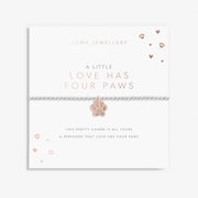 Joma Jewellery A Little Love Has Four Paws Bracelet on sentiment card, silver-plated beaded stretch Bracelet with rose gold paw charm and crystal detail