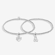 Joma Merry Christmas linked bracelets with heart present and star charms