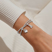 Joma Merry Christmas Linked Infinity Bracelets worn on wrist

