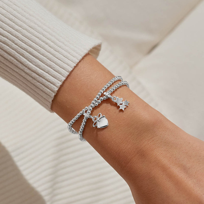 Joma Merry Christmas Linked Infinity Bracelets worn on wrist
