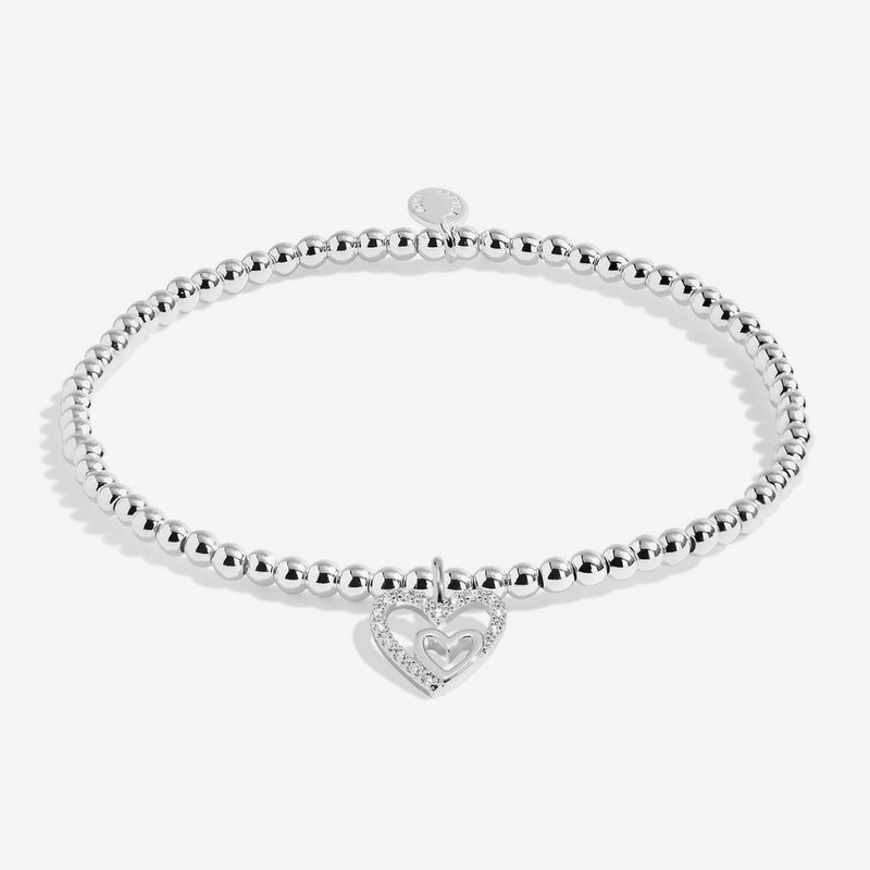 Silver Joma Jewellery bracelet with sparkling mother and daughter heart charm