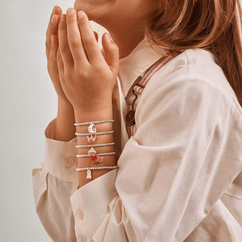Child wearing Joma Jomees moon and heart kids bracelet