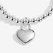 Close-up of silver heart padlock charm on silver-plated beaded stretch Bracelet