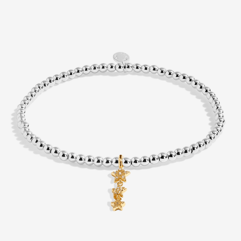 Silver and gold-plated Joma birthday bracelet with cascading star charm