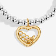 Close-up of Joma Bee-Utiful bracelet heart charm