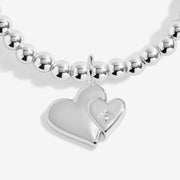 Close-up of Joma Mother & Daughter bracelet double heart charm