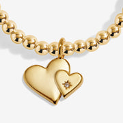 Close-up of Joma Mother & Daughter bracelet double heart charm
