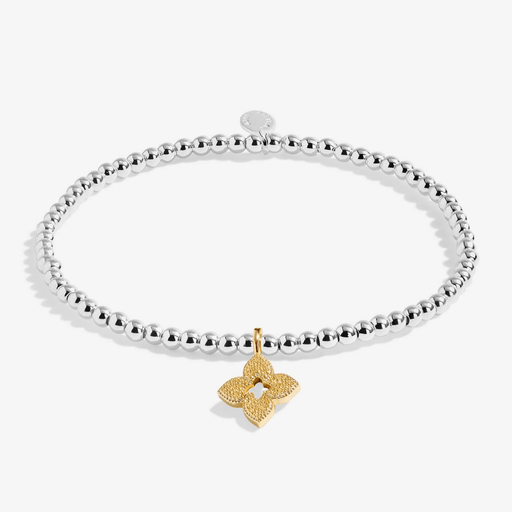 Silver and gold-plated Joma friendship bracelet with textured flower charm