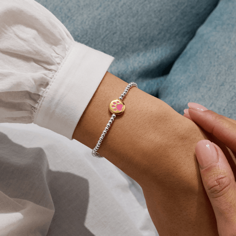 Joma Jewellery Pawsitive Vibes paw bracelet worn on a wrist