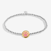 Silver and gold-plated Joma bracelet with a pink paw-print charm
