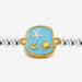 Close-up of blue enamel ocean charm on silver-plated beaded Bracelet with gold-tone starfish and shell icons