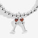 Close-up of champagne glasses charm with orange heart crystals on silver-plated beaded Bracelet