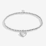 Joma silver-plated stretch Bracelet with heart charm and star crystal detail displayed on a white background