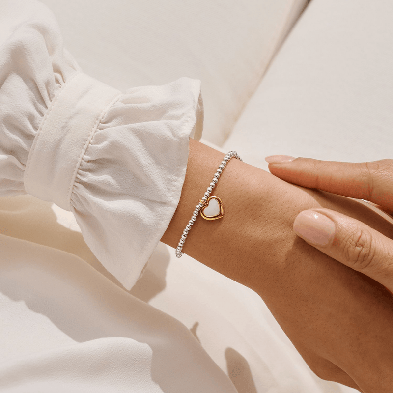 Joma Jewellery With Love Always heart bracelet worn on a wrist