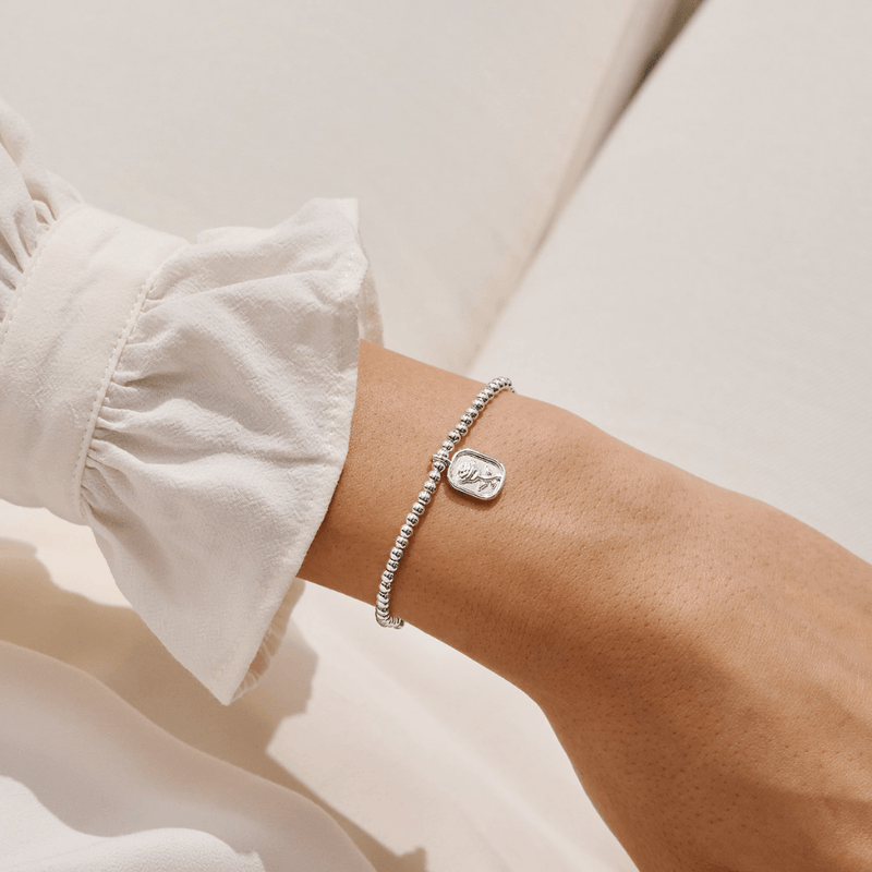 Joma Jewellery positive affirmation bracelet worn on the wrist