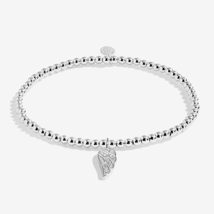 Joma Jewellery A Little “Christmas Angel” silver beaded bracelet with pavé angel‑wing charm – thoughtful festive gift.
