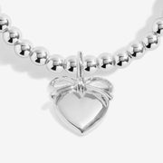 Close-up of Joma Jewellery Merry Christmas Daughter bracelet charm
