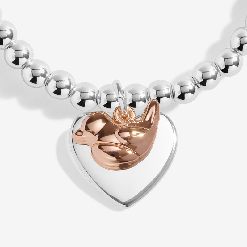 Close‑up of rose‑gold robin charm on Joma Jewellery Christmas bracelet – sparkling festive bracelets & gifts for women.