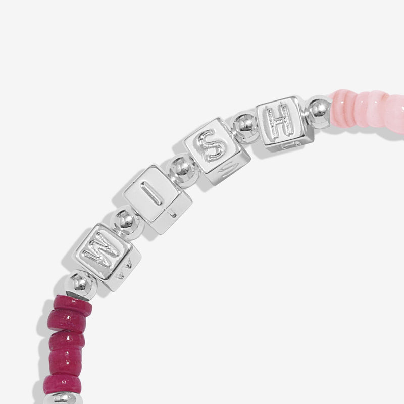 Joma Christmas Wish bracelet with WISH letter cubes