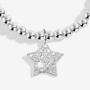 Close-up of Joma Jewellery Christmas Wishes bracelet charm
