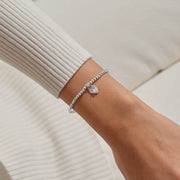 Joma Jewellery friendship heart bracelet worn on wrist
