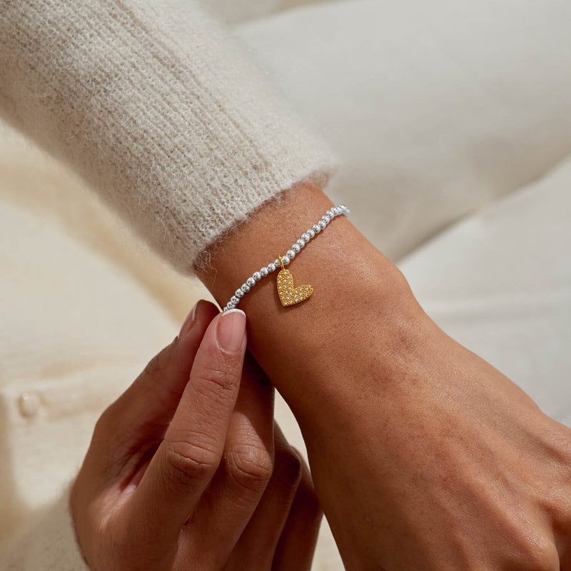 Joma Jewellery Love You To Bits bracelet worn on wrist