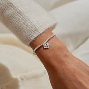 Infinity heart bracelet by Joma Jewellery styled on wrist – chic bracelets and perfect gifts for women.