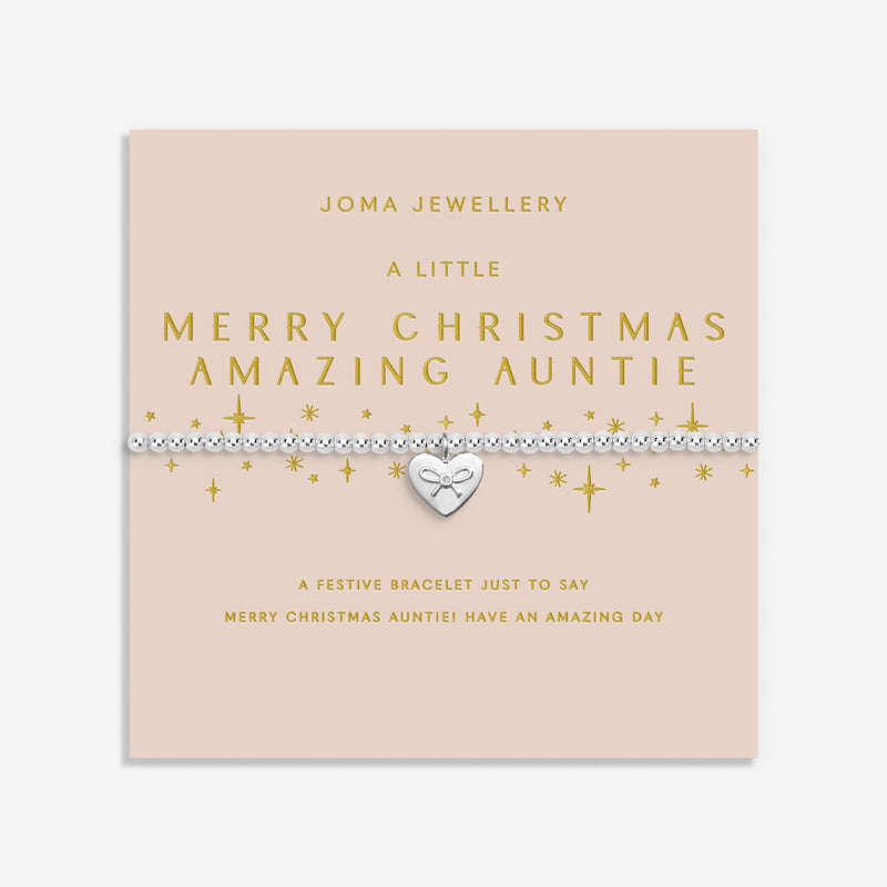 Display card for A Little “Merry Christmas Amazing Auntie” bracelet – blush backdrop with gold stars and loving greeting.