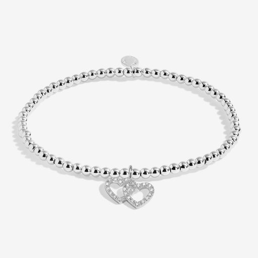 Joma Jewellery A Little “Merry Christmas Fabulous Friend” silver beaded bracelet with twin pavé‑heart charm – perfect Christmas gift for her.

