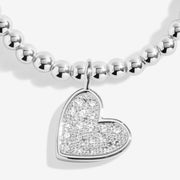 Close-up of Joma Merry Christmas Lovely Daughter bracelet heart charm