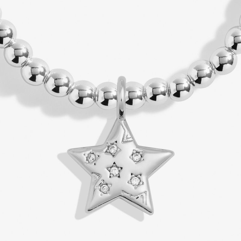 Close-up of Joma Merry Christmas Teacher bracelet star charm