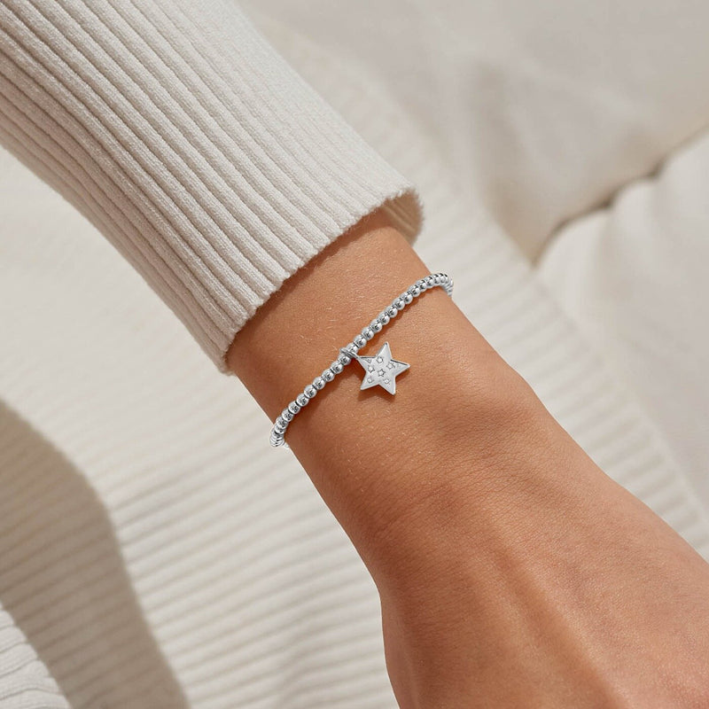 Joma Merry Christmas Teacher bracelet worn on wrist