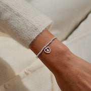 “One in a Million” open‑heart bracelet styled on wrist – sparkling jewellery for Christmas or everyday.
