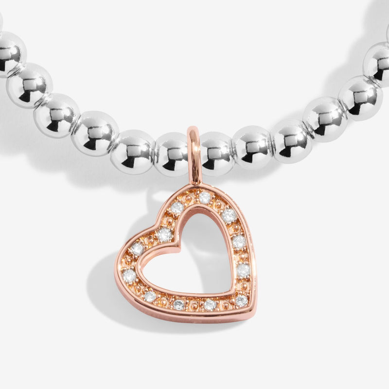 Close‑up pavé rose‑gold open heart charm on Joma Jewellery silver bead bracelet – sparkling bracelets, perfect gifts for women.
