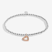 Joma Jewellery silver bead bracelet with pavé rose‑gold heart charm – elegant Joma bracelets, ideal gifts for her and women.

