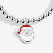 Close-up of Joma Santa bracelet charm
