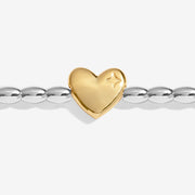 Close-up of Joma Season To Sparkle bracelet gold heart charm