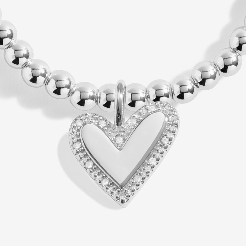 Close-up of Joma Jewellery Next Chapter bracelet heart charm