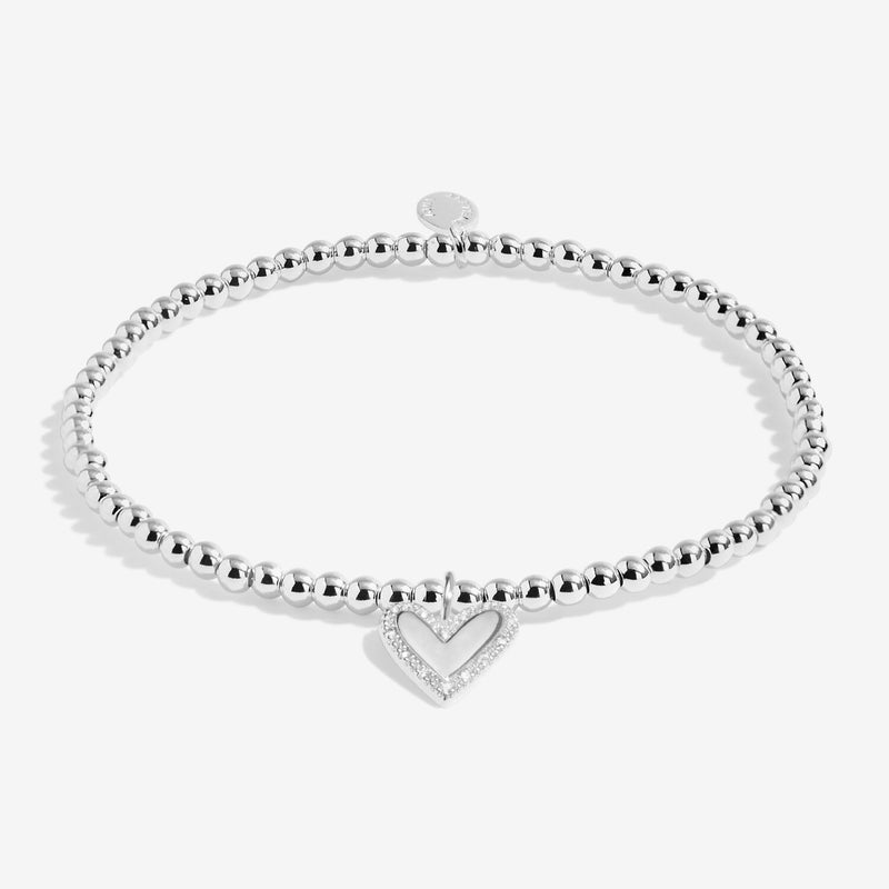 Joma Jewellery A Little Here’s To Your Next Chapter Bracelet with sparkle heart charm
