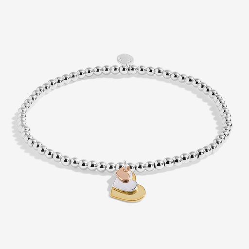Joma Jewellery three‑tone heart charm bracelet with silver beads – stylish bracelets, gifts for her and gifts for women.
