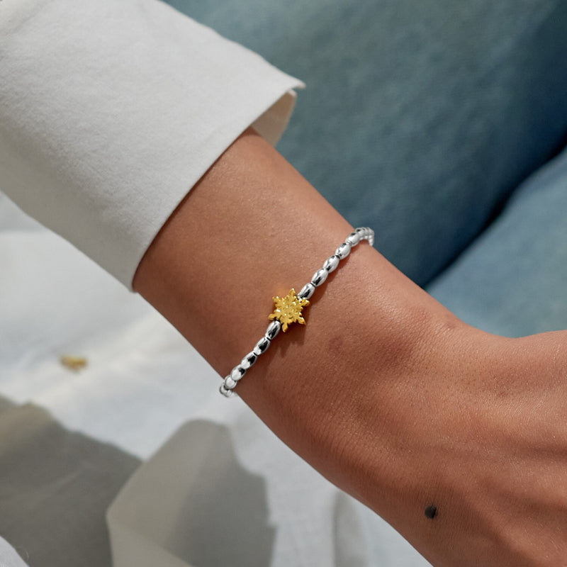 Joma Winter Wishes bracelet worn on wrist