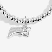 Close-up of Joma Christmas Wish bracelet shooting star charm