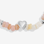 Close-up of Joma With Love bracelet silver heart bead