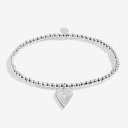 Joma Jewellery With Love silver beaded bracelet with layered heart charm, cut‑out on white background.
