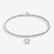 Kids’ silver‑plated beaded bracelet featuring an open‑star charm

