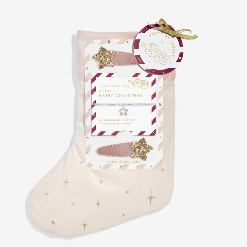 Kids’ Christmas stocking gift set with silver star bracelet and glitter‑star hair clips by Joma Jewellery
