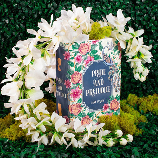 Pride and Prejudice book-shaped vase styled with white flowers