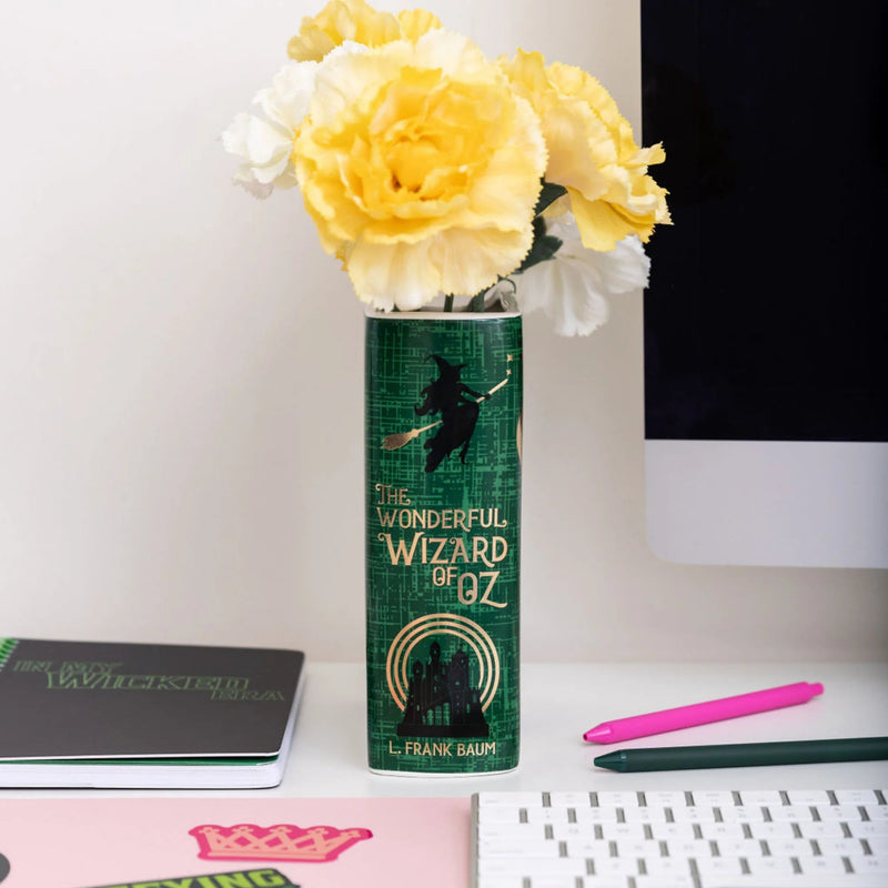 Side view of Wizard of Oz ceramic book vase showing sculpted pages